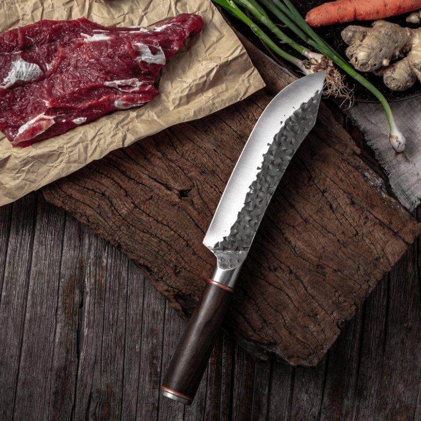Rustikt kockkniv böjd
